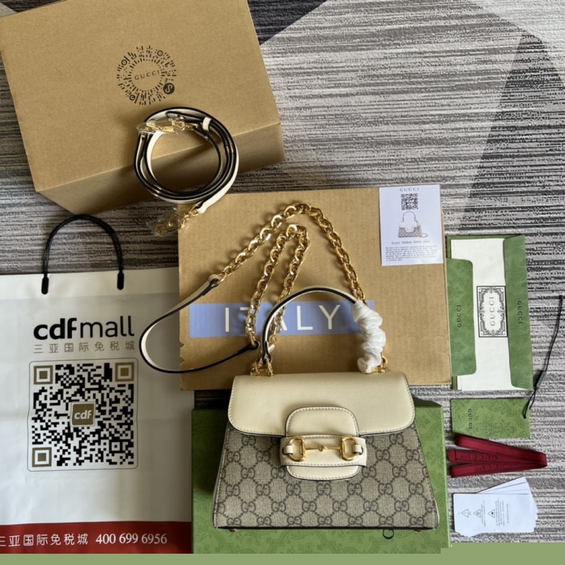 G*u*i top handle bags